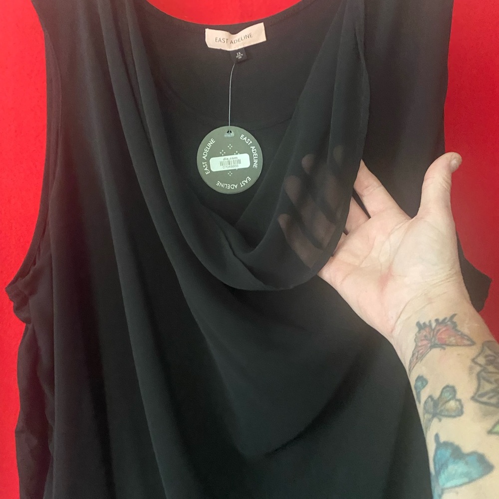 East Adeline  Rayon and Polyester black silk top
Women’s 3X